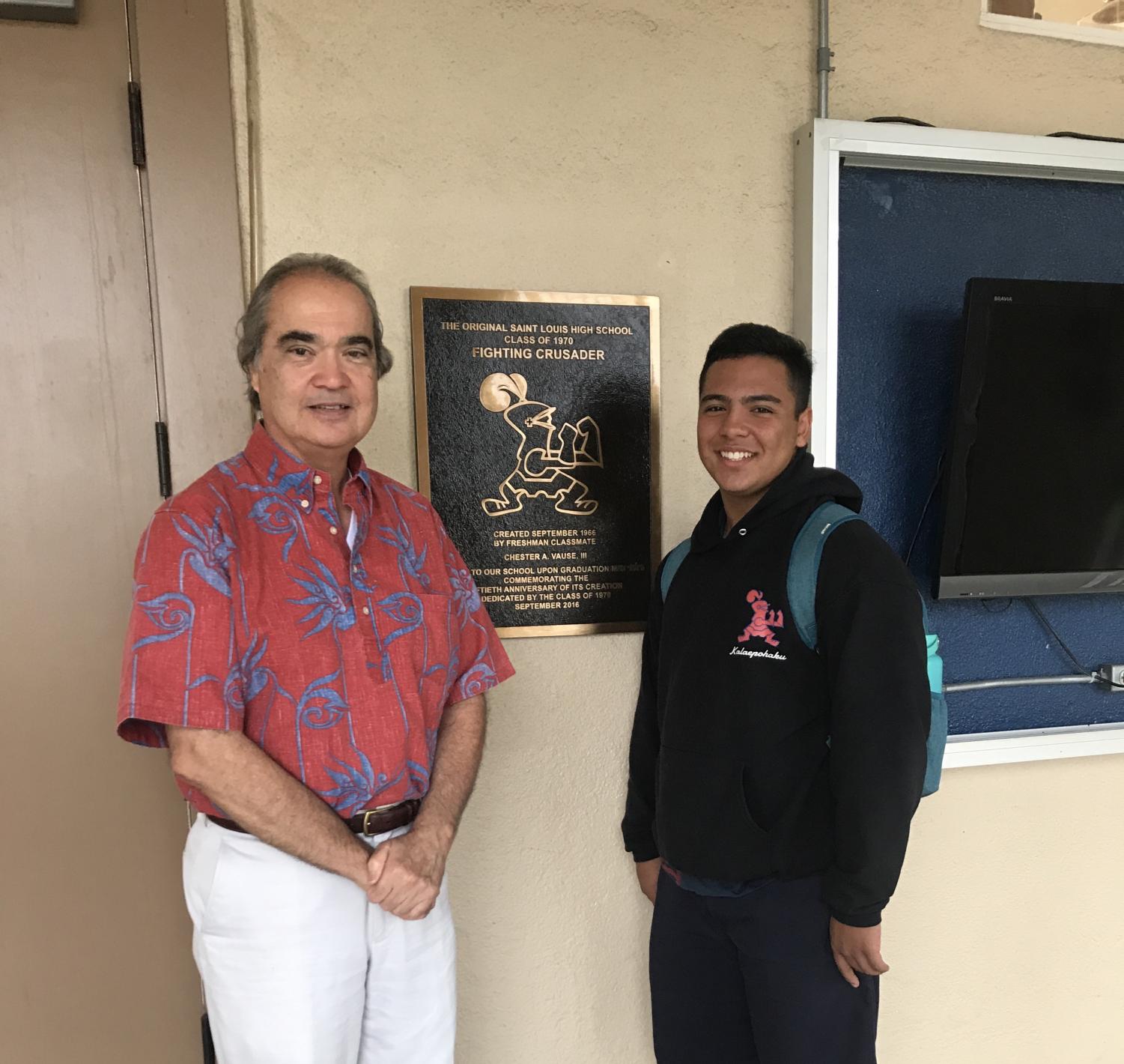 Chester Vause '70 and Adrain Bates-Domingo '18 pose next to the original