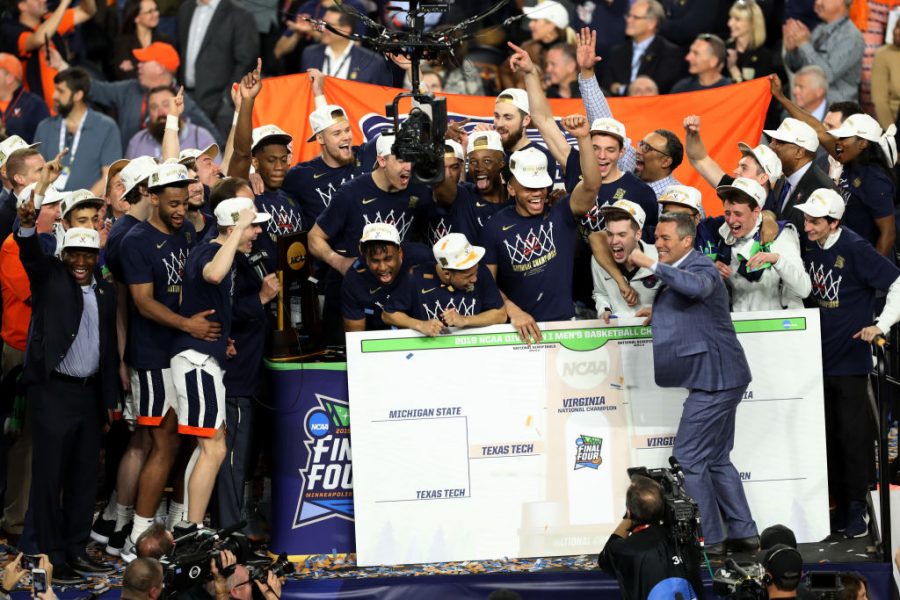 MINNEAPOLIS, MINNESOTA - APRIL 08: The Virginia Cavaliers celebrate their National Championship after defeating the Texas Tech Red Raiders in the 2019 NCAA men's Final Four National Championship game at U.S. Bank Stadium on April 08, 2019 in Minneapolis, Minnesota. (Photo by Matt Marriott/NCAA Photos via Getty Images)