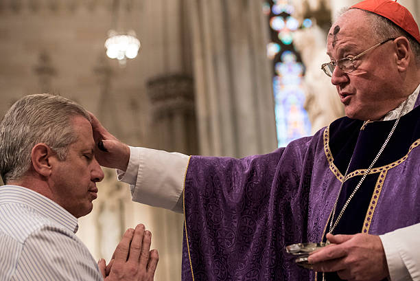 NEW YORK, NY - FEBRUARY 10:  Cardinal Timothy Dolan distributes ashes on Ash Wednesday at St. Patricks Cathedral on February 10, 2016 in New York City. The day marks the start of the lent for Catholics world wide.  (Photo by Andrew Renneisen/Getty Images)
