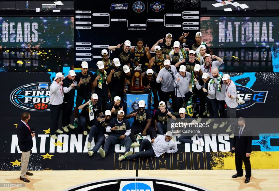 INDIANAPOLIS, INDIANA - APRIL 05: The Baylor Bears pose with the National Championship trophy after winning the National Championship game of the 2021 NCAA Mens Basketball Tournament against the Gonzaga Bulldogs at Lucas Oil Stadium on April 05, 2021 in Indianapolis, Indiana. The Baylor Bears defeated the Gonzaga Bulldogs 86-70. (Photo by Justin Casterline/Getty Images)