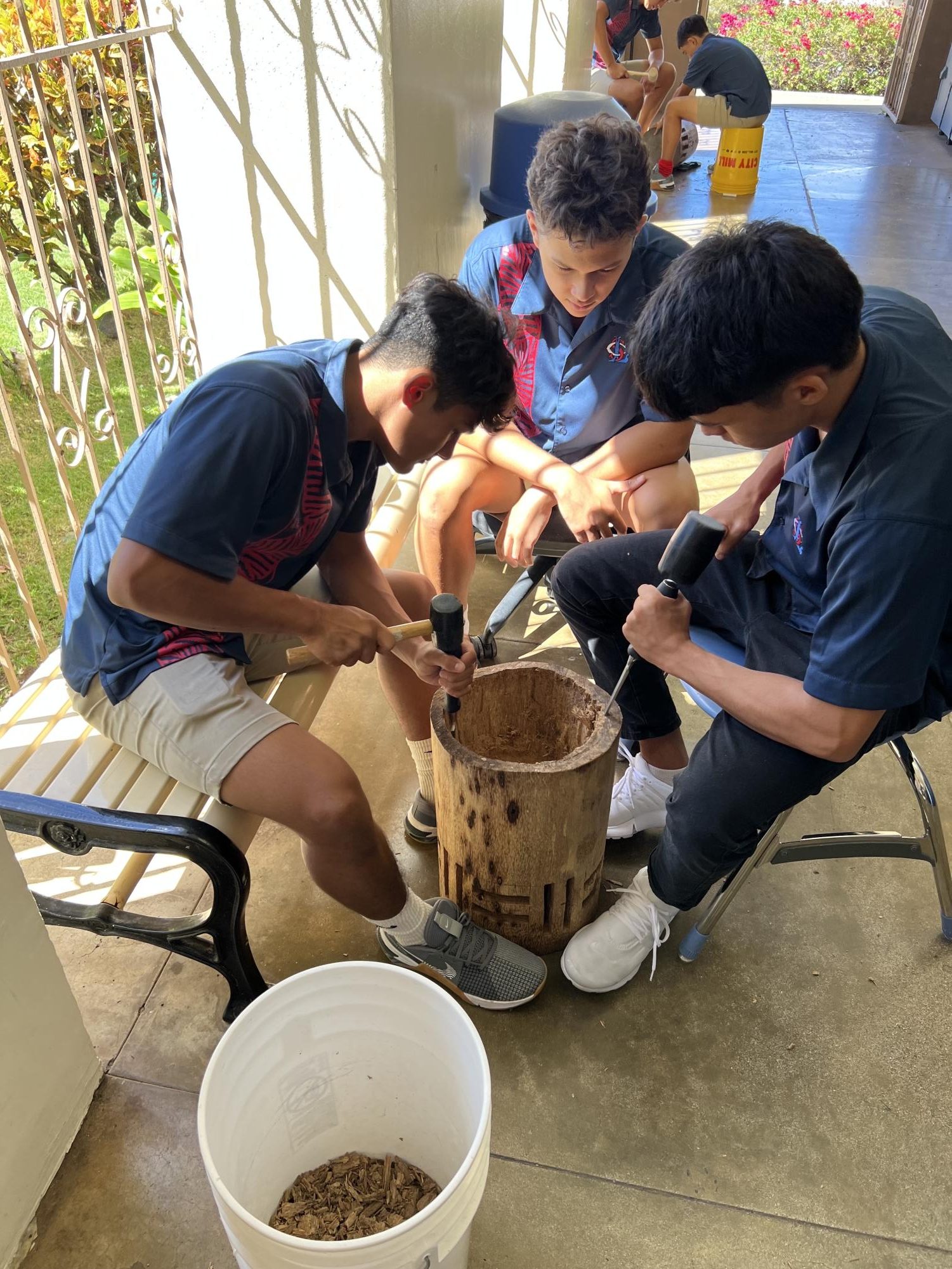 Students create a pahu drum as part of the program.